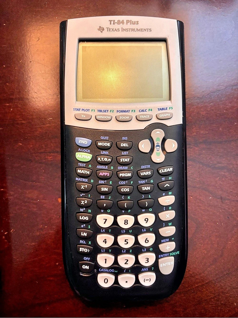 Texas Instruments TI-84 Plus Graphing Calculator with Case
